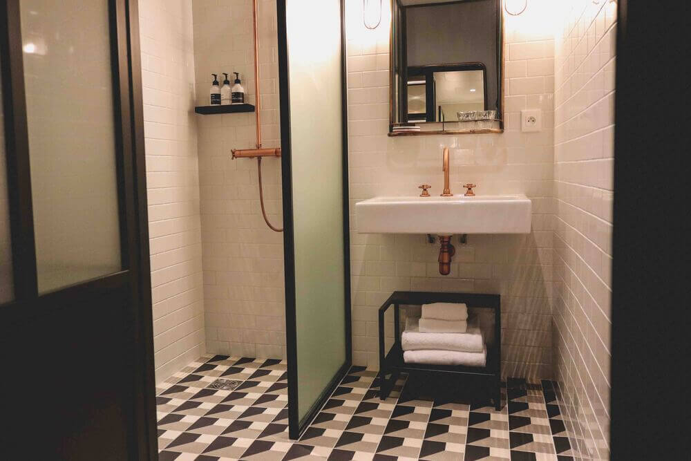 Hoxton Paris - White sink with copper taps