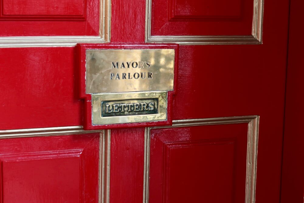 Windsor - red door that states Mayor's Parlour
