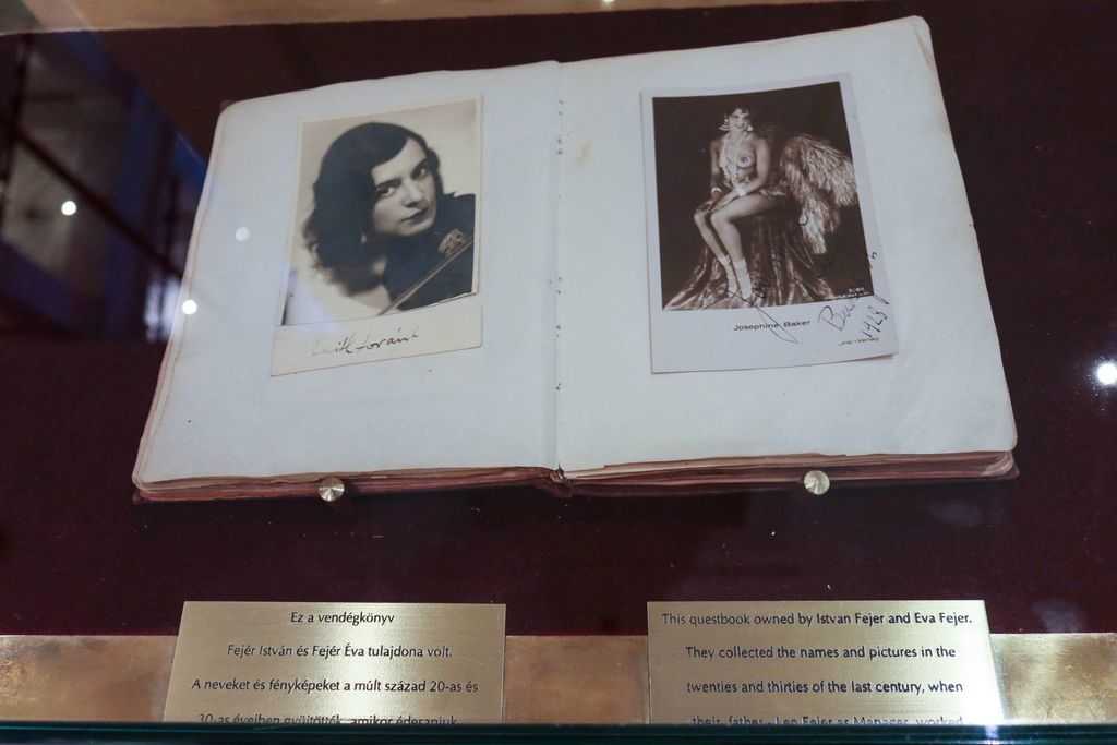 Corinthia Budapest - Open book with two black and white photos of famous guests