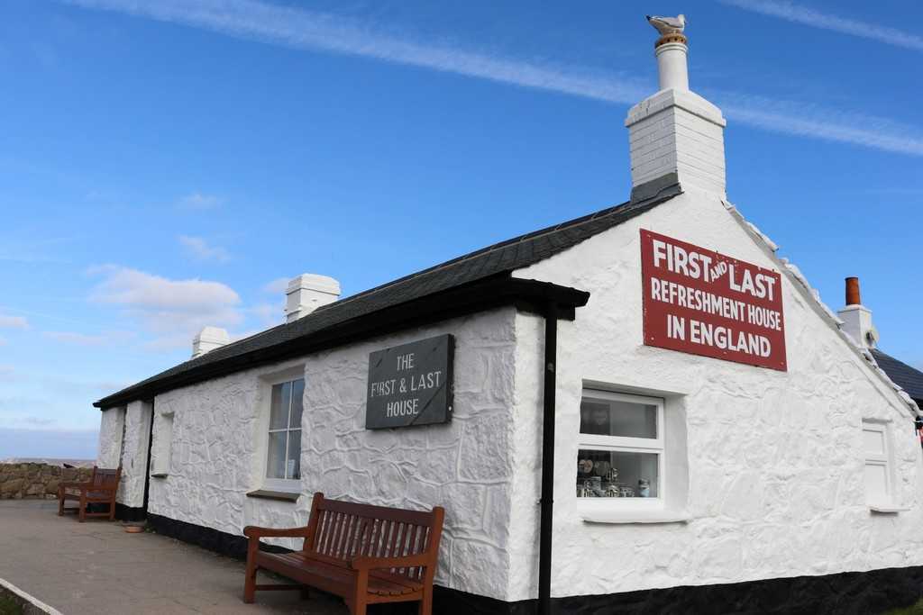 South West Cornwall - White stone cottage showing "the first and last house"